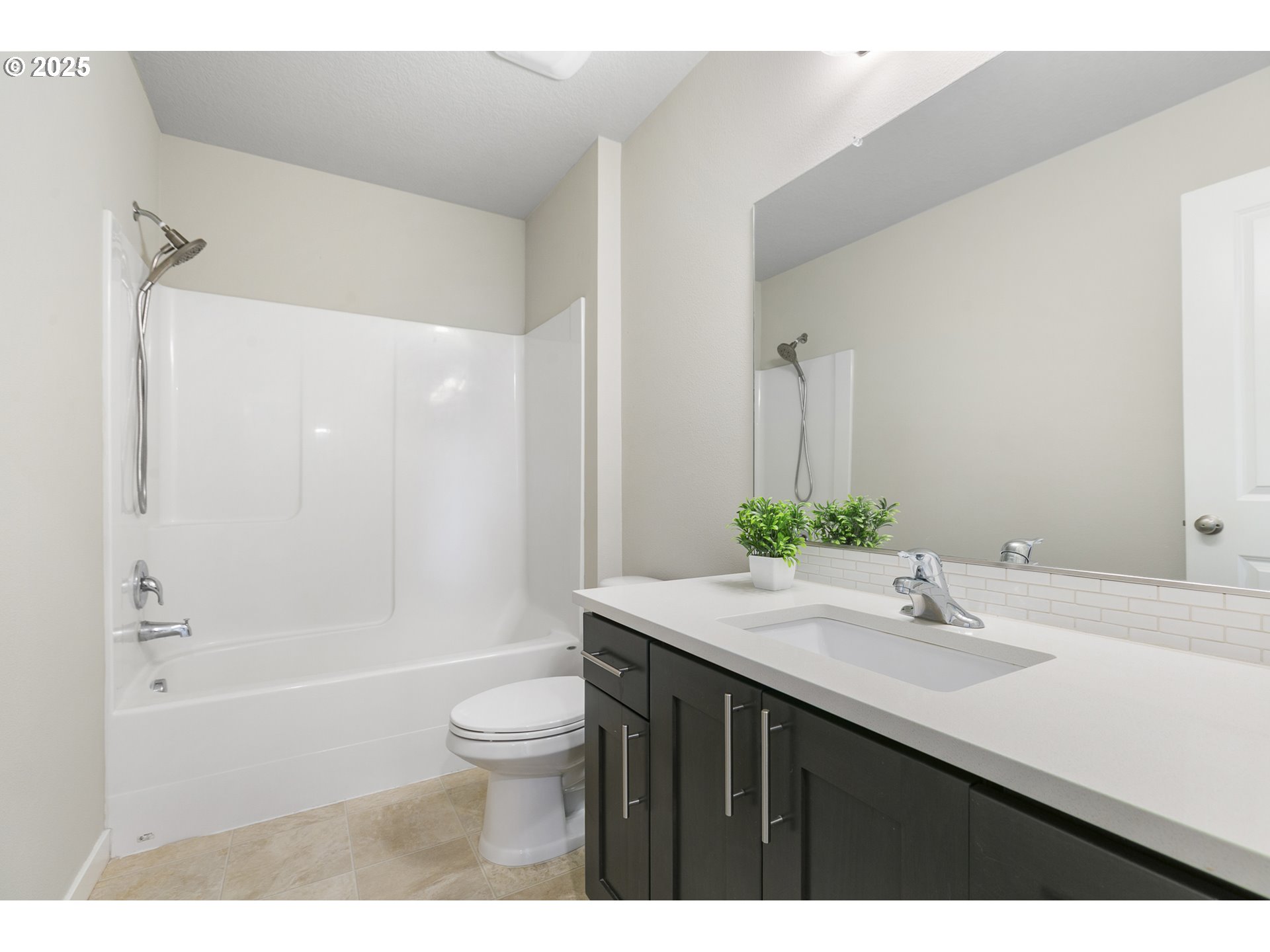 1815 Northeast 172nd Street Ridgefield, WA 98642 - Photo 11 of 19 a bathroom with a sink a toilet and shower