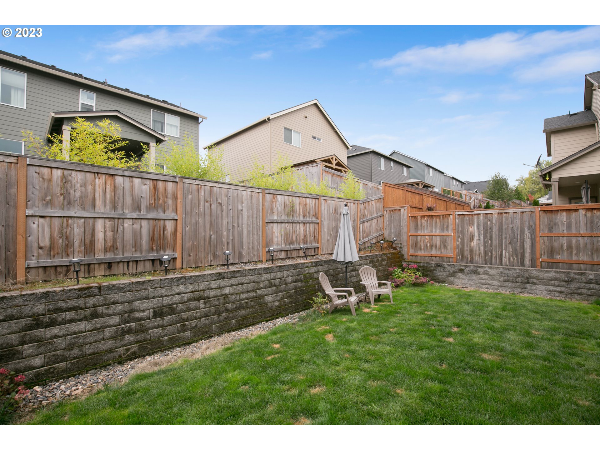 1815 Northeast 172nd Street Ridgefield, WA 98642 - Photo 14 of 19 a view of a chair and table in backyard