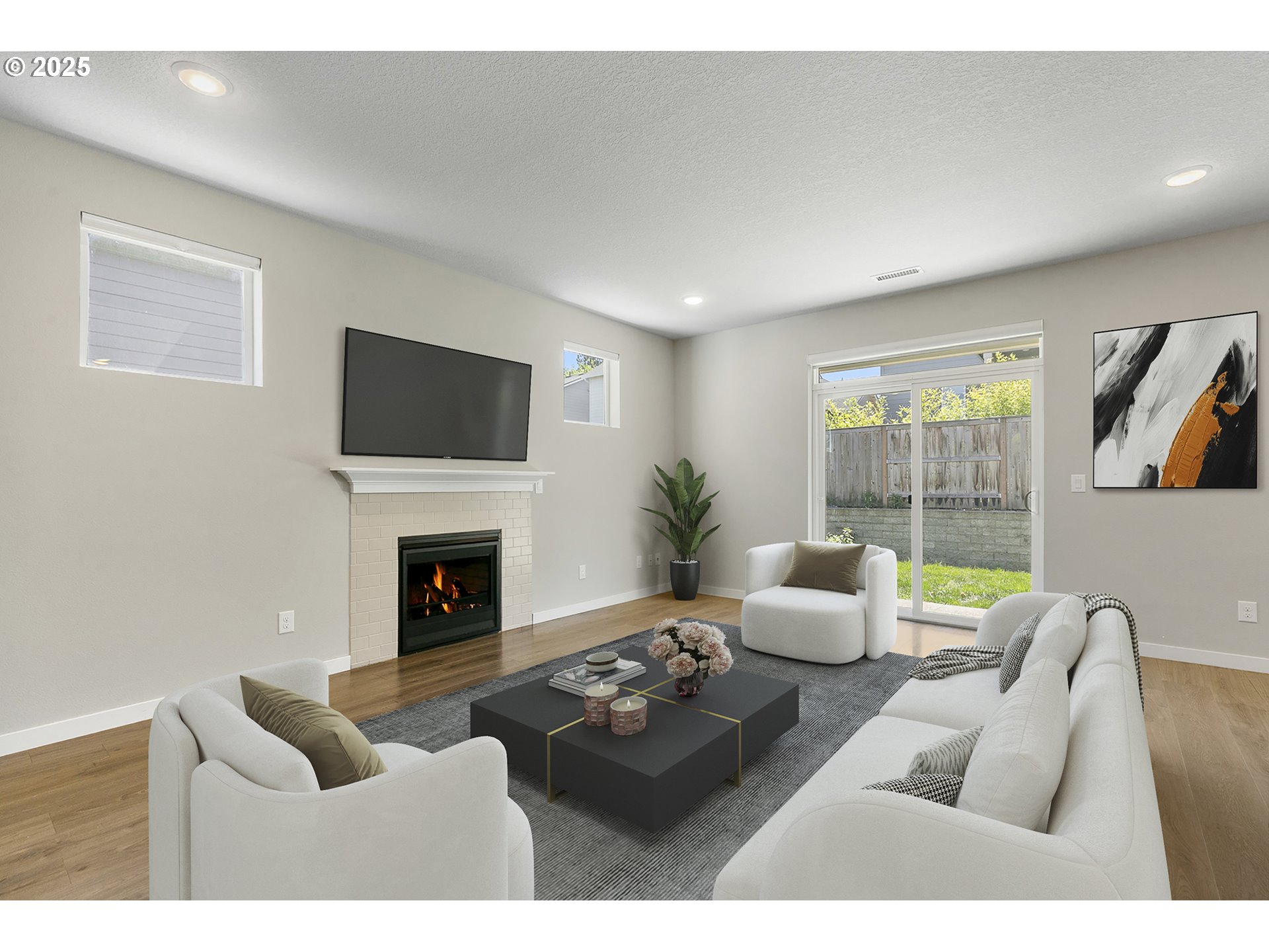 1815 Northeast 172nd Street Ridgefield, WA 98642 - Photo 6 of 19 a living room with furniture a fireplace and a large window