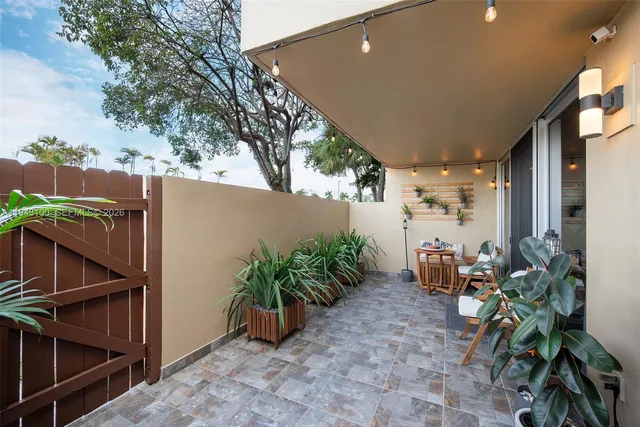 a view of a cars parked in front of a house