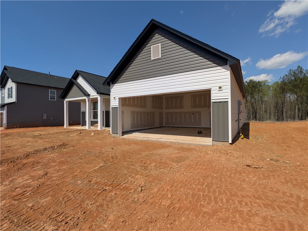 204 Bellflower Lane Pendleton, SC 29670 - Photo 3 of 44 This new construction features a two-car garage, offering ample space and direct access to the home.