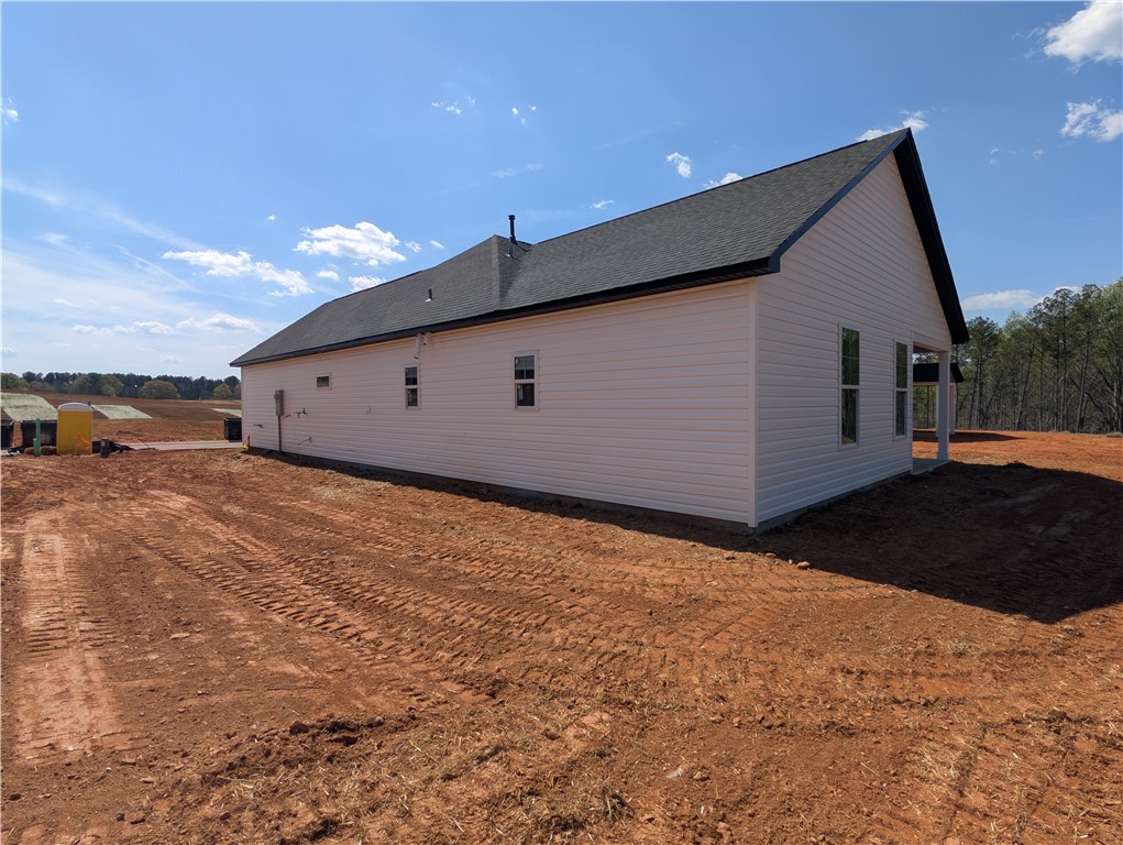 204 Bellflower Lane Pendleton, SC 29670 - Photo 5 of 44 This newly constructed home features a crisp exterior against a vibrant natural backdrop.