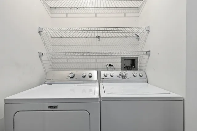 a utility room with dryer and washer