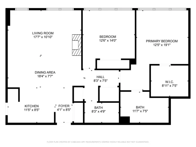 a backyard of a house with outdoor seating