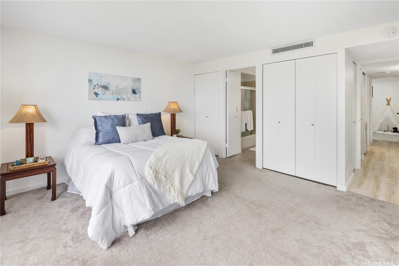 500 Lunalilo Home Road, Unit 16G Honolulu, HI 96825 - Photo 10 of 25 Primary bedroom with ensuite