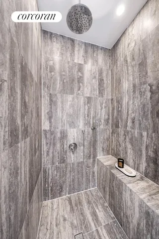 a spacious bathroom with a bathtub and sink