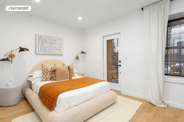 a bathroom with a toilet sink vanity tub and shower