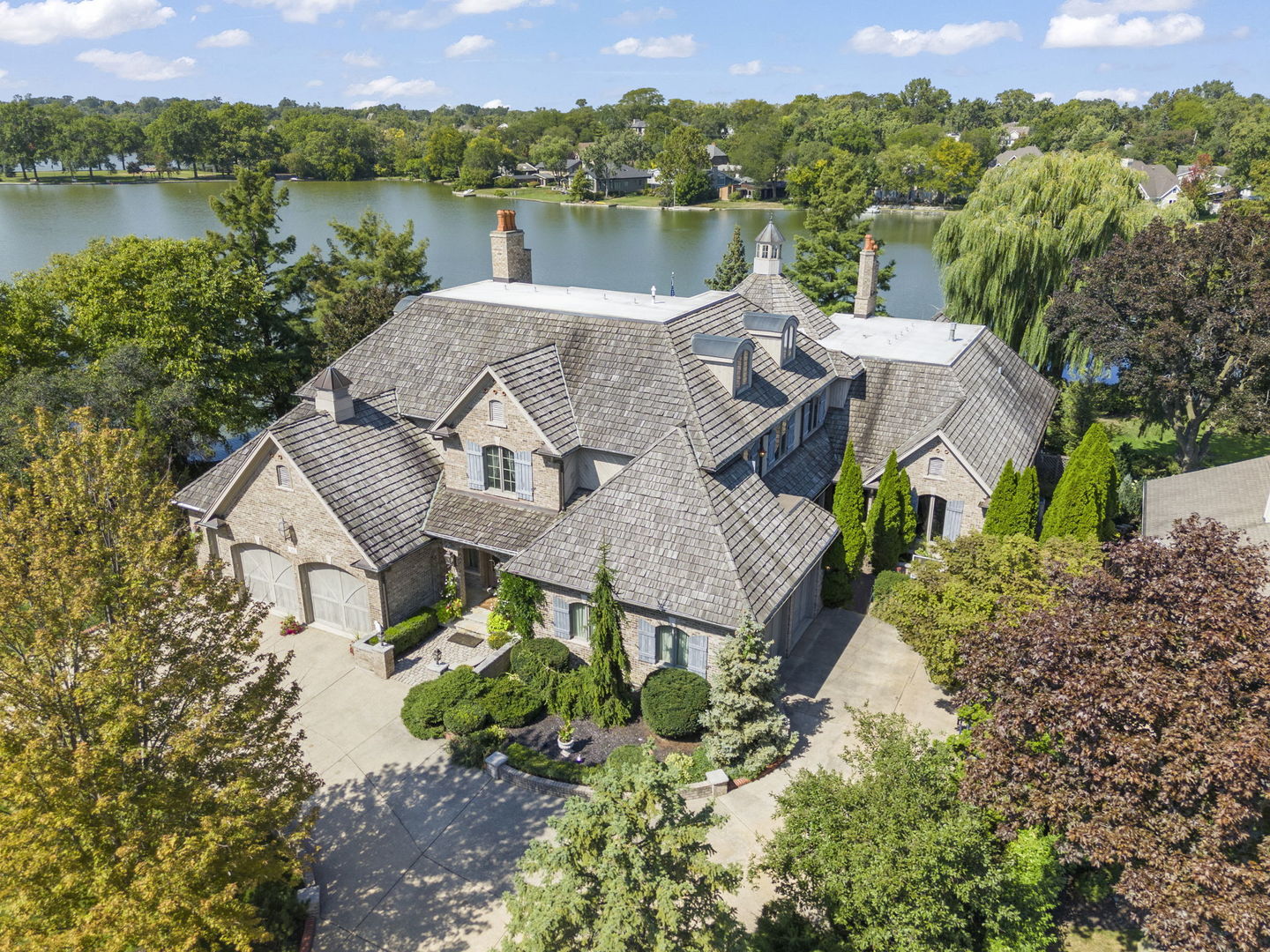 561 West 58th Street Hinsdale, IL 60521 - Photo 1 of 87 an aerial view of a house with a lake view