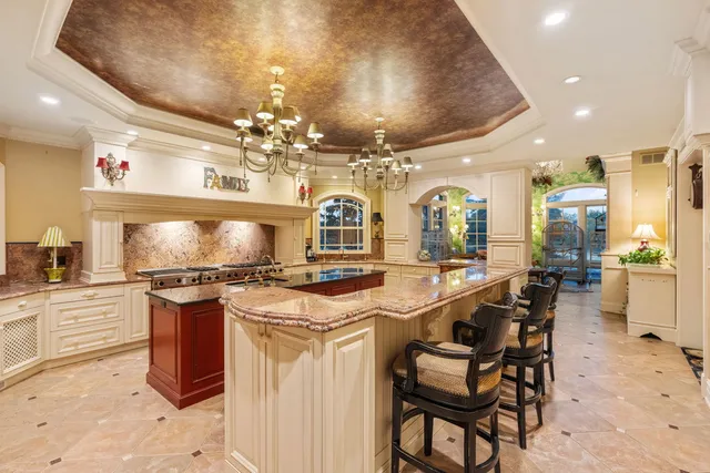 a view of a balcony with chair and floor to ceiling windows