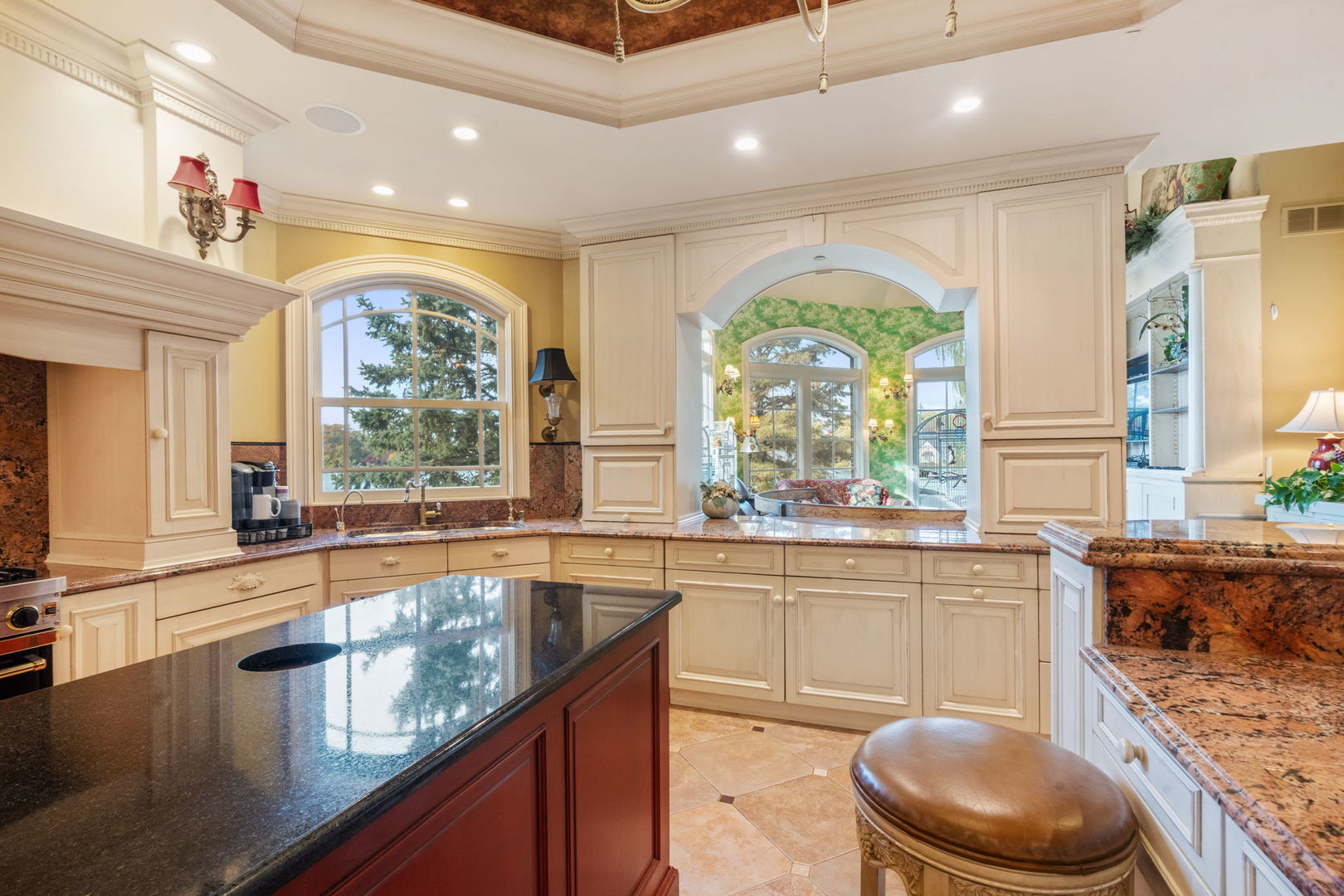 561 West 58th Street Hinsdale, IL 60521 - Photo 14 of 87 a large kitchen with kitchen island granite countertop a large window