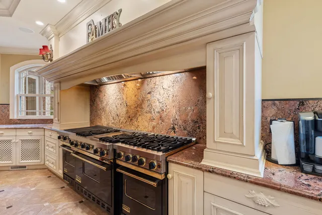 a view of an entryway with a floor to ceiling window