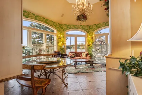 a view of an entryway with a floor to ceiling window