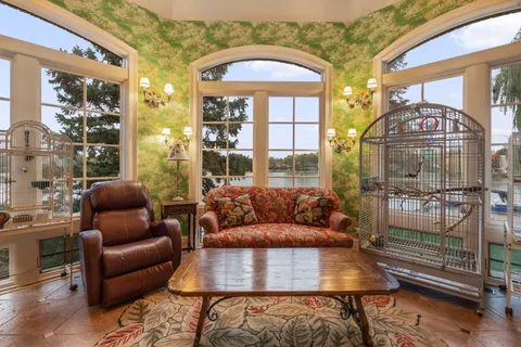 a view of entryway with a fireplace