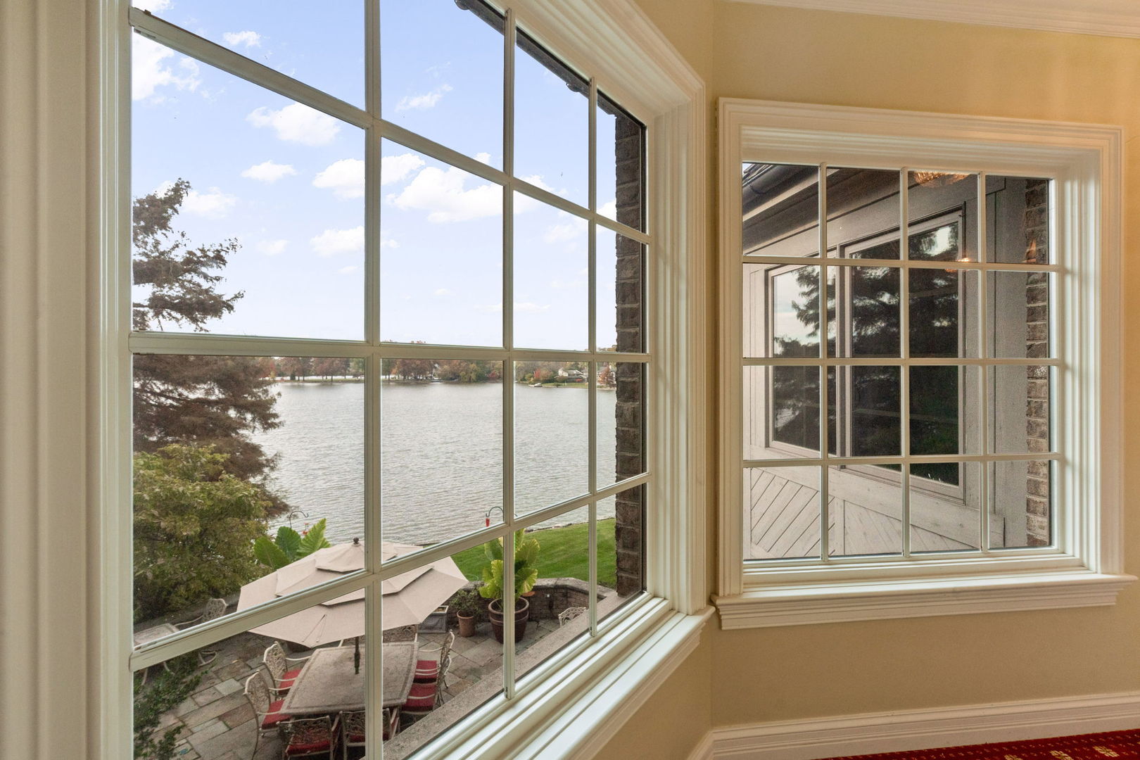 561 West 58th Street Hinsdale, IL 60521 - Photo 20 of 87 a view of a balcony with chair and floor to ceiling windows