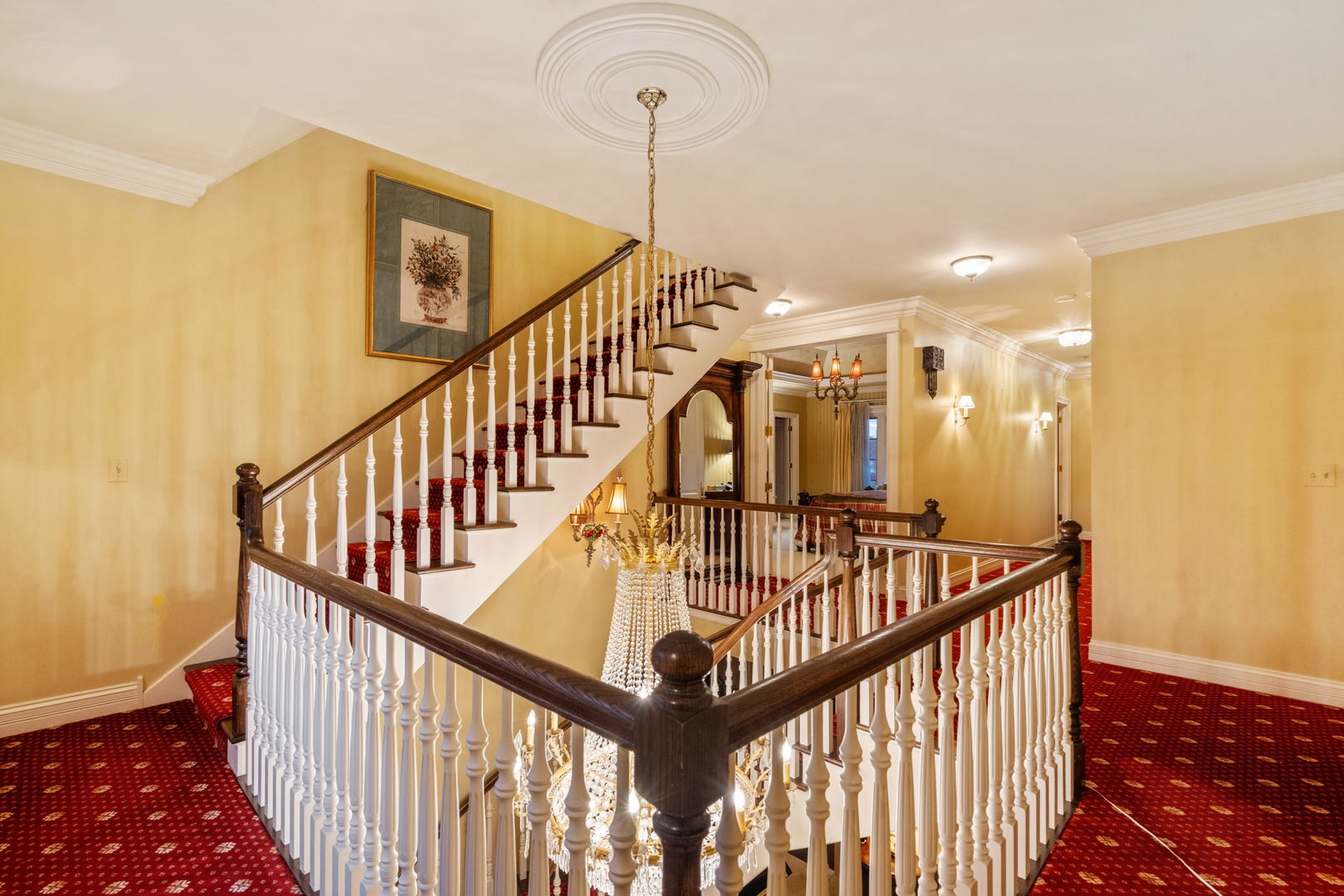 561 West 58th Street Hinsdale, IL 60521 - Photo 33 of 87 a view of staircase with railing and a chandelier