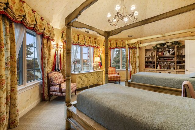 a kitchen with stainless steel appliances granite countertop a stove and a refrigerator