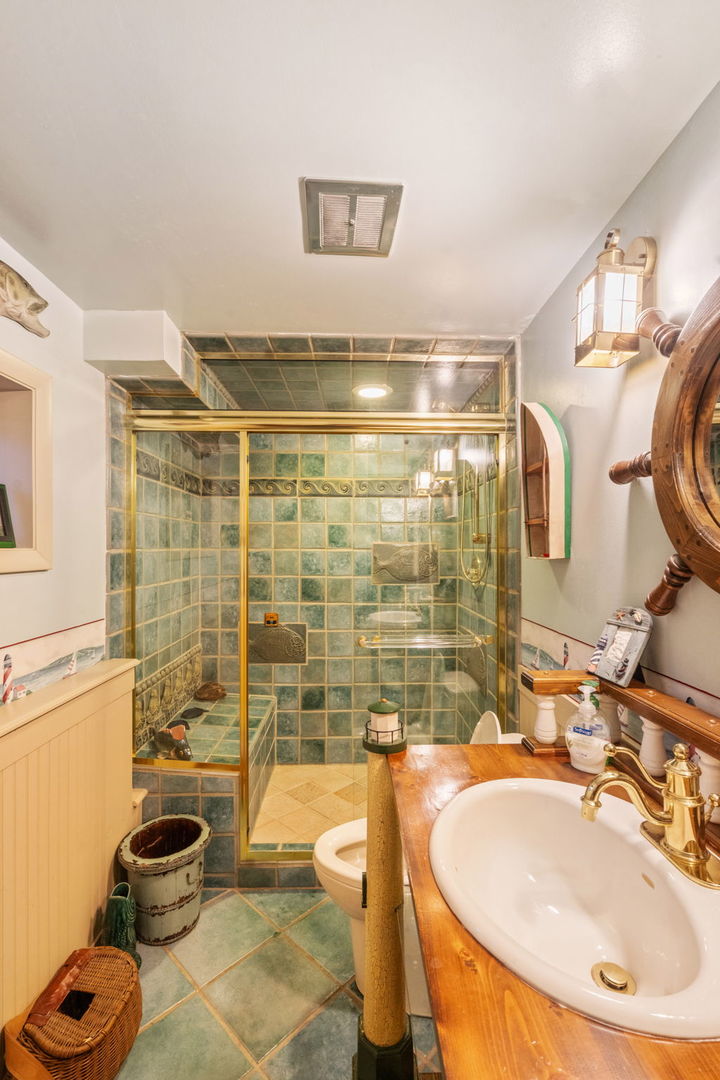 561 West 58th Street Hinsdale, IL 60521 - Photo 59 of 87 a bathroom with a sink toilet and shower