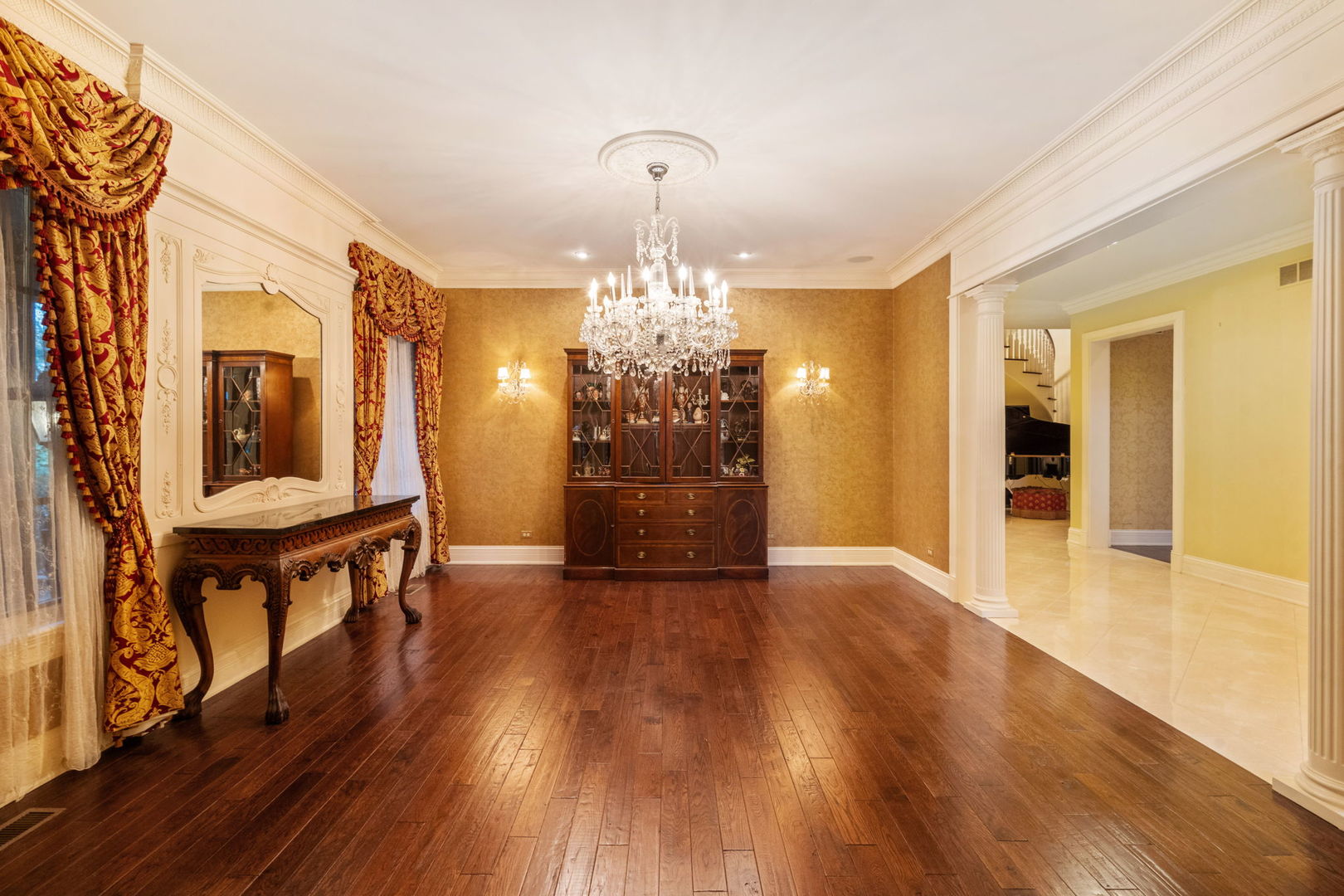 561 West 58th Street Hinsdale, IL 60521 - Photo 8 of 87 a view of a chandelier and wooden floor windows and chandelier