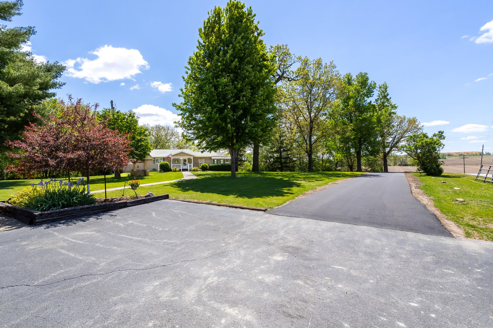 2660 252nd Street De Witt, IA 52742 - Photo 15 of 45 a view of a park with large trees