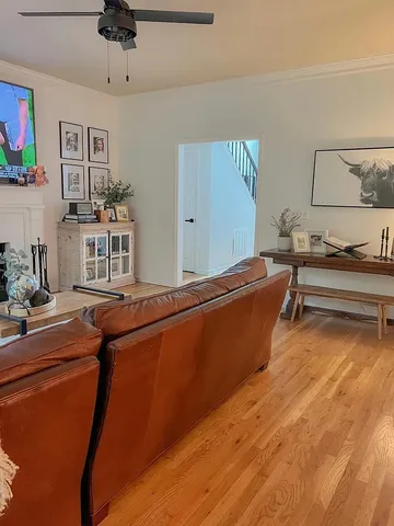a room with pool table and flat screen tv