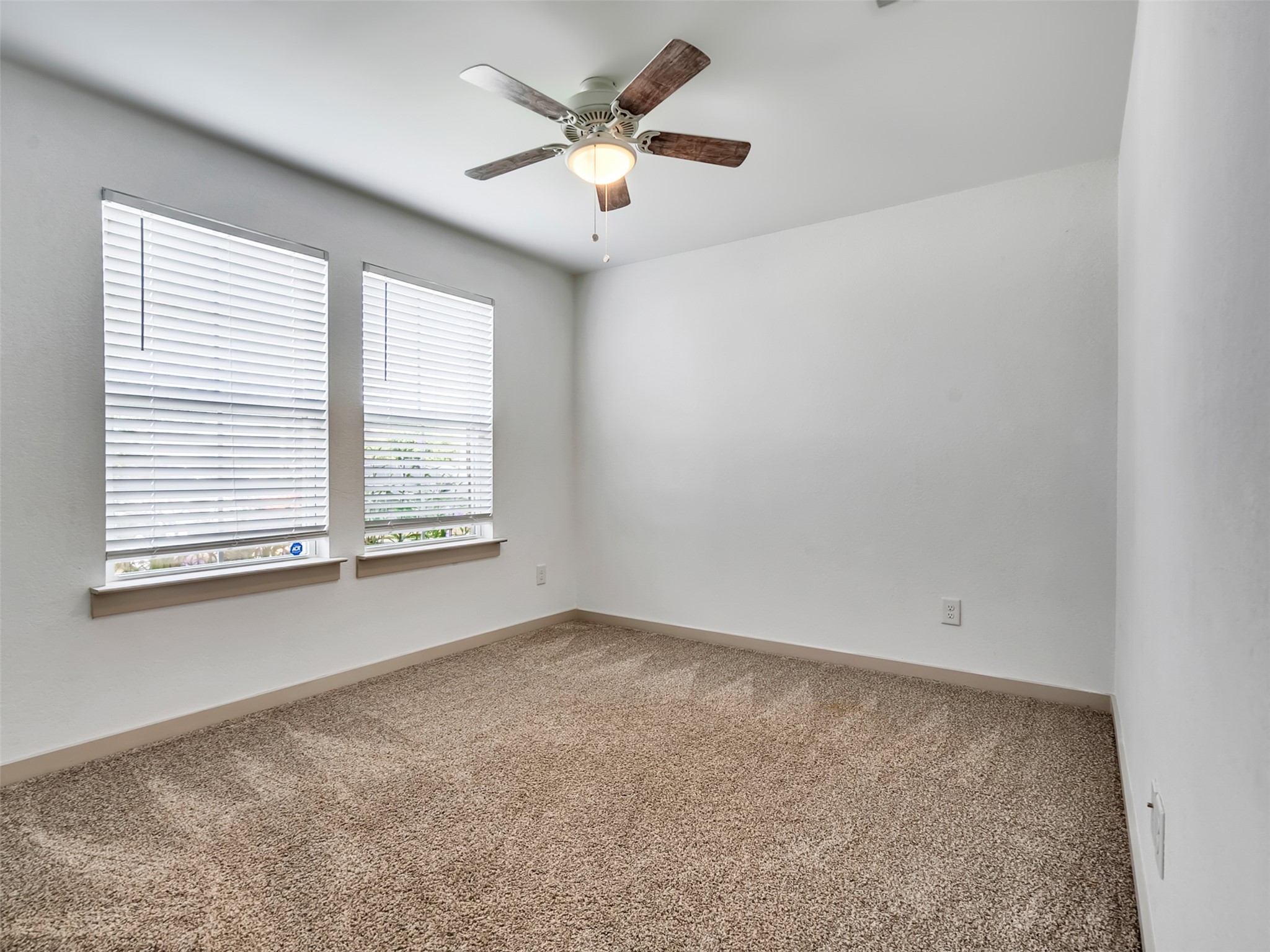 8003 Alcott Forest Lane Rosharon, TX 77583 - Photo 6 of 41 an empty room with a window