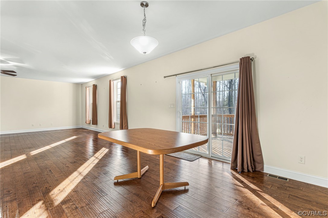 1602 Blakely Road Crozier, VA 23039 - Photo 12 of 44 a living room with wooden floor and large window