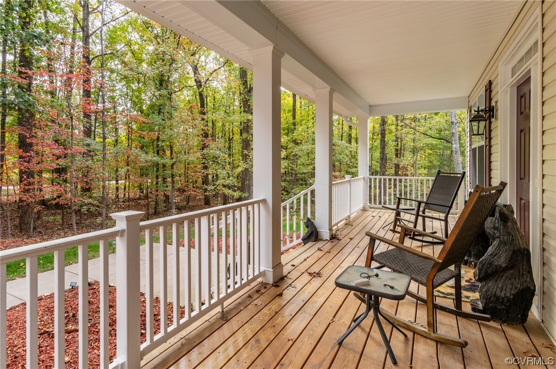1602 Blakely Road Crozier, VA 23039 - Photo 3 of 44 a view of a balcony with wooden floor
