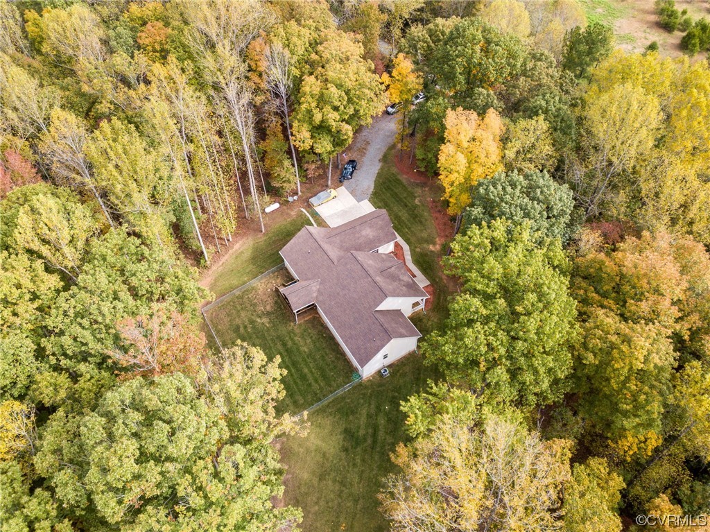1602 Blakely Road Crozier, VA 23039 - Photo 41 of 44 a view of a yard with plants and large trees