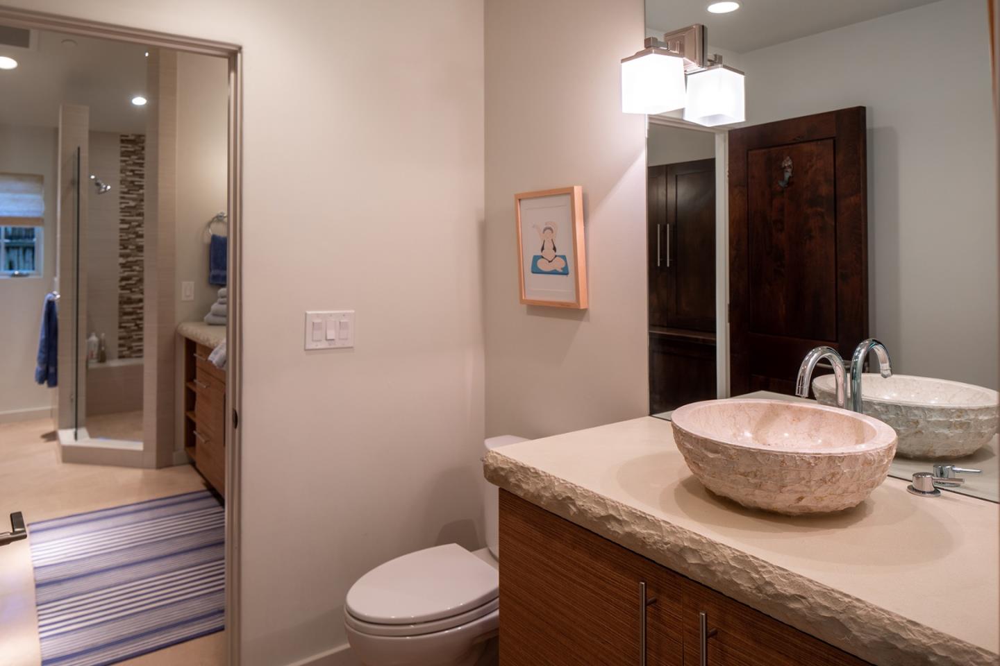 0 Monte Verde & 13th Corner Carmel, CA 93923 - Photo 18 of 31 a bathroom with a granite countertop sink a toilet a mirror and shower