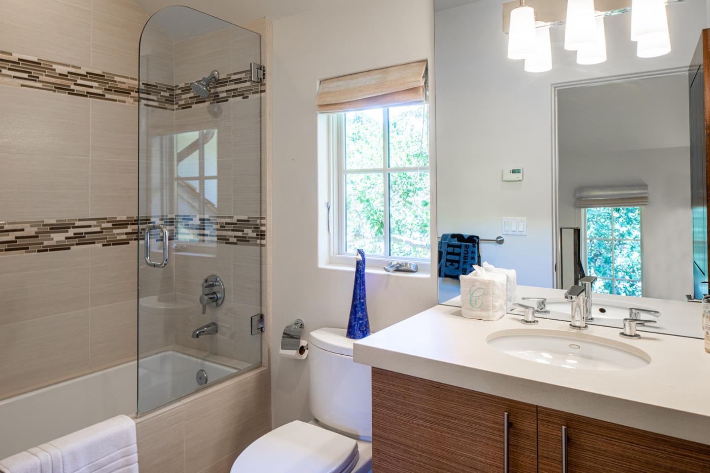 0 Monte Verde & 13th Corner Carmel, CA 93923 - Photo 22 of 31 a bathroom with a granite countertop sink a toilet a mirror and bathtub