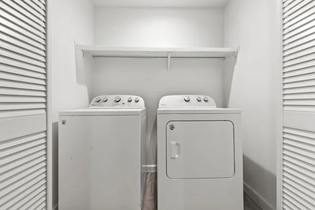 a utility room with dryer and washer