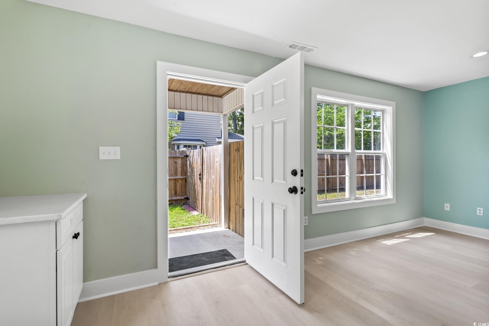 540 Boundary Avenue Murrells Inlet, SC 29576 - Photo 3 of 40 Entryway featuring light wood-type flooring