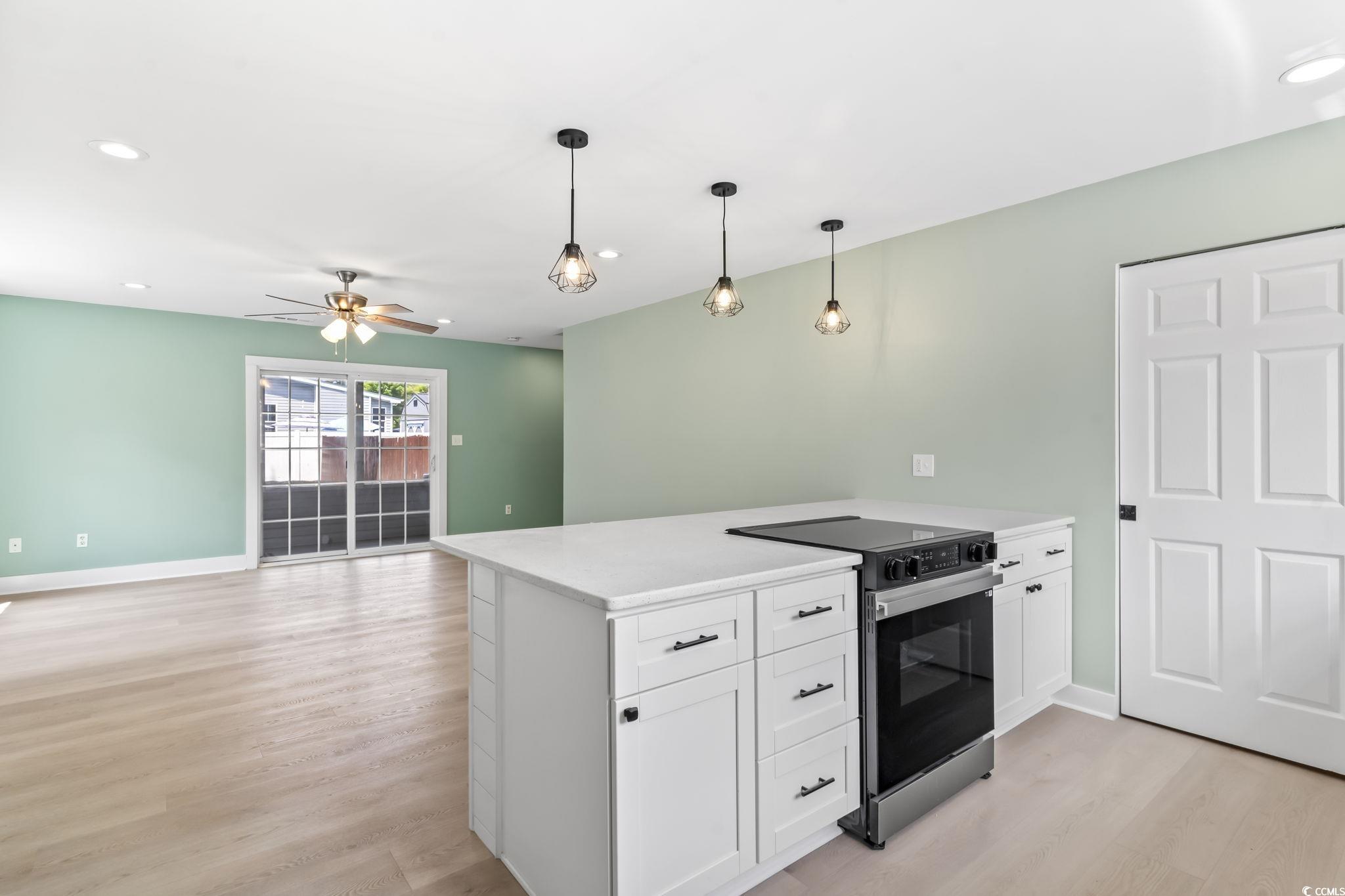 540 Boundary Avenue Murrells Inlet, SC 29576 - Photo 10 of 40 Kitchen with light hardwood / wood-style flooring,