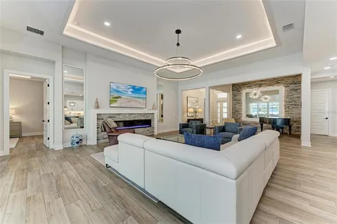 a kitchen with granite countertop a stove and cabinets