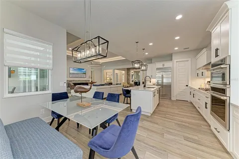 a utility room with faucet washer and dryer