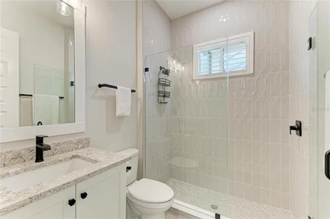 a view of swimming pool with a patio