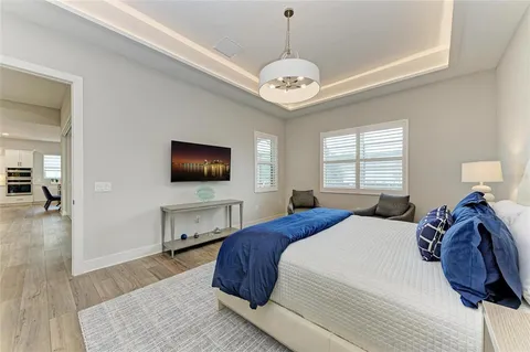 a view of a swimming pool with a porch