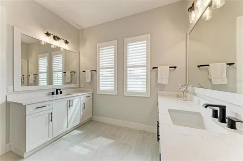 an aerial view of a house with a ocean view