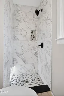 a bathroom with a sink a vanity and a mirror