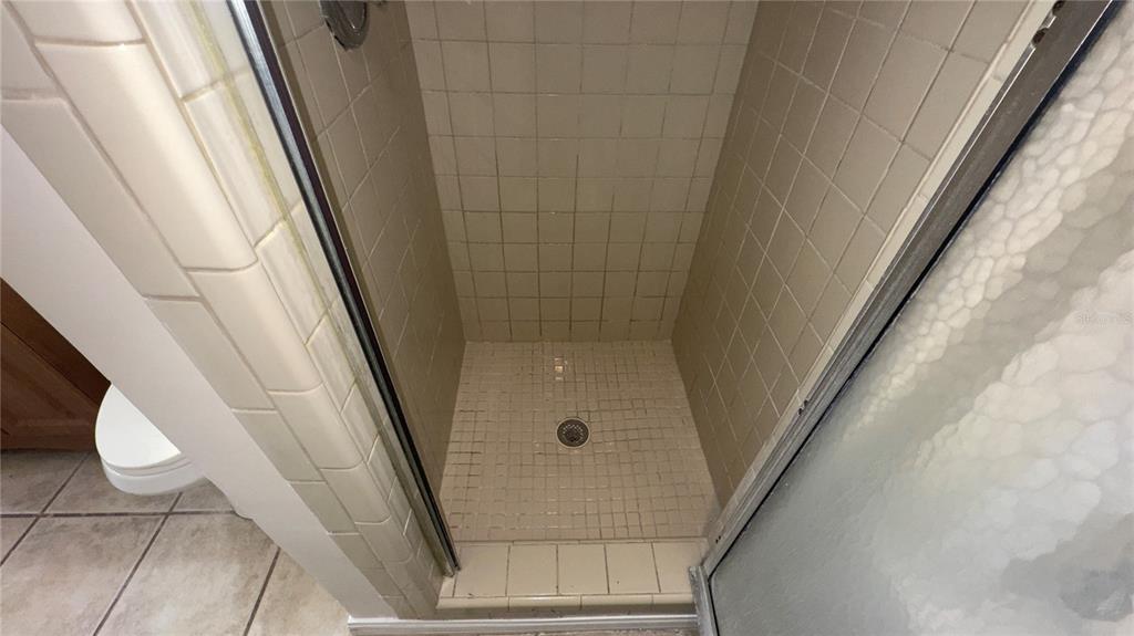 616 Massachusetts Avenue, Unit A St. Cloud, FL 34769 - Photo 12 of 15 a bathroom with a sink