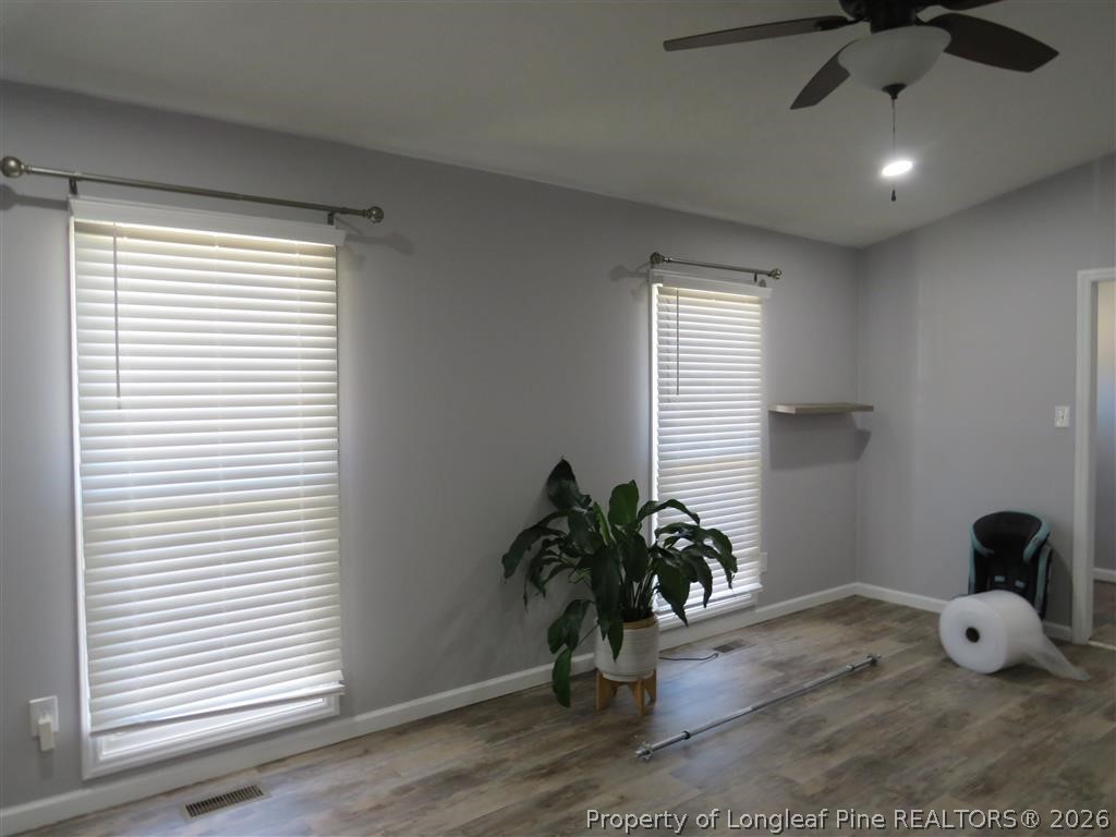 760 Ashbrook Road Fayetteville, NC 28314 - Photo 5 of 13 a view of a workspace with furniture and a window
