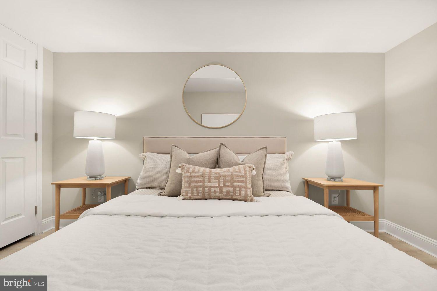 1753 W Street Southeast, Unit B Washington, DC 20020 - Photo 16 of 27 a bedroom with a bed and a lamp