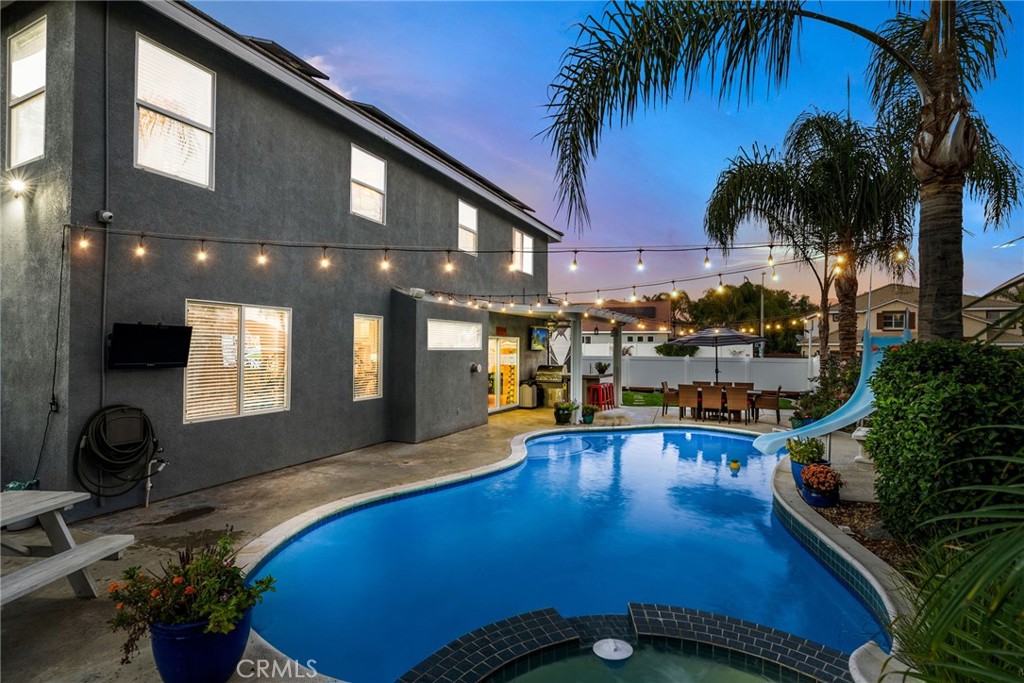 29602 Cool Meadow Drive Menifee, CA 92584 - Photo 24 of 31 a view of a chairs and table in patio