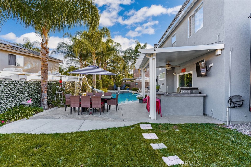 29602 Cool Meadow Drive Menifee, CA 92584 - Photo 26 of 31 a view of a house with a patio