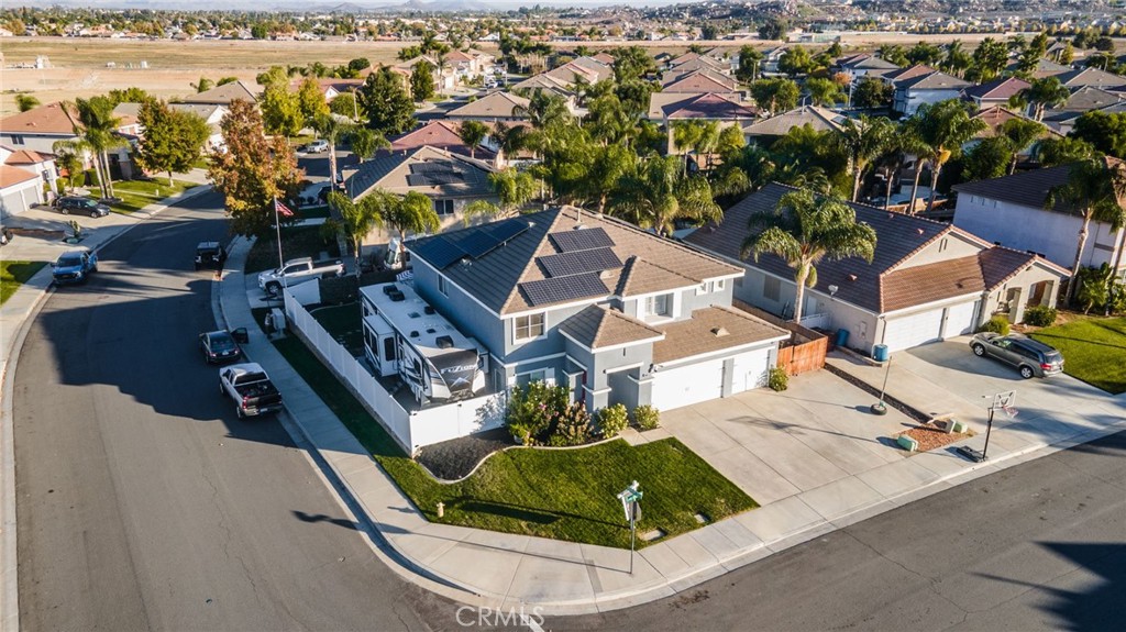 29602 Cool Meadow Drive Menifee, CA 92584 - Photo 29 of 31 an aerial view of residential houses with outdoor space and swimming pool