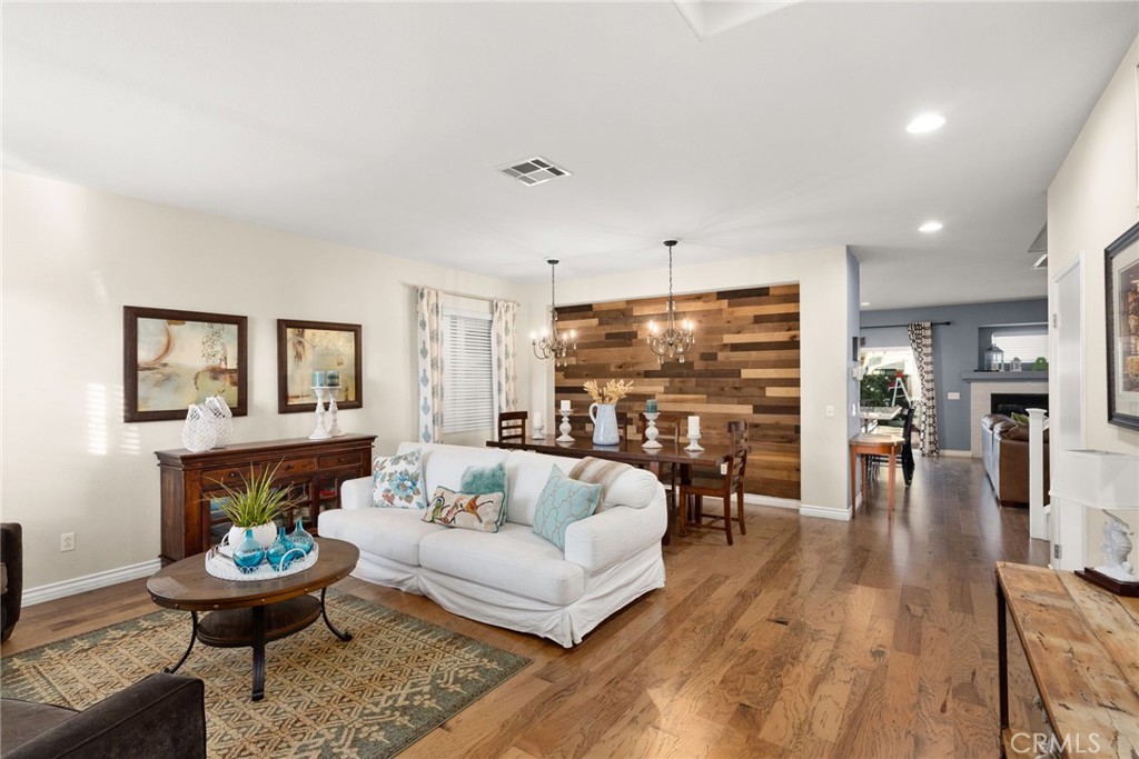 29602 Cool Meadow Drive Menifee, CA 92584 - Photo 5 of 31 a living room with furniture and a wooden floor