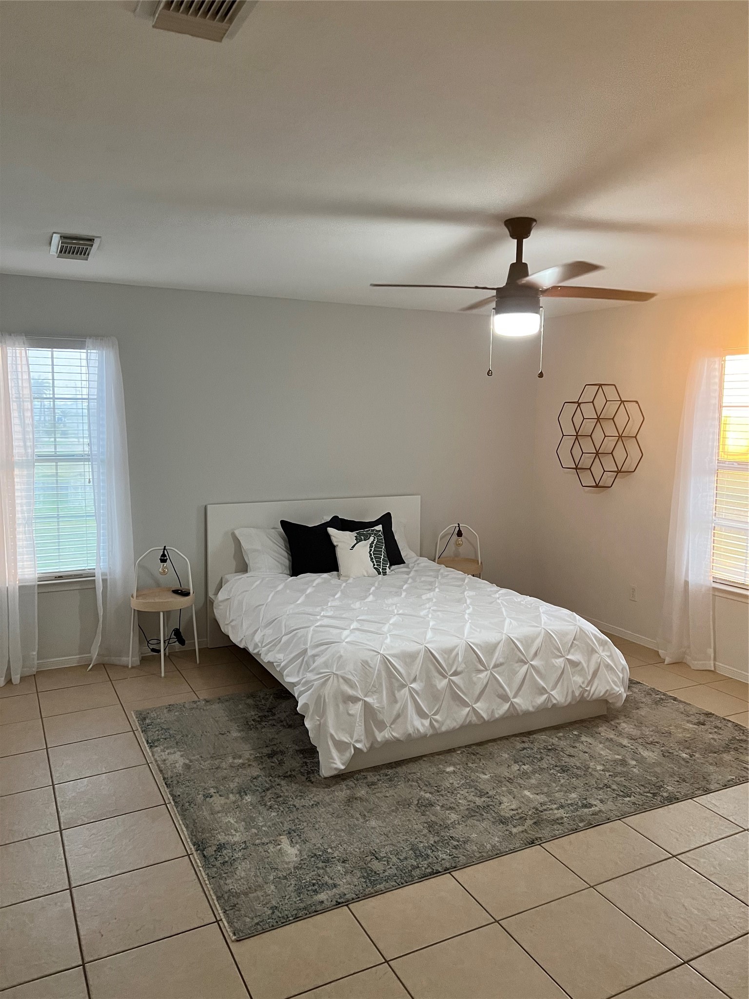 125 Marlin Avenue Freeport, TX 77541 - Photo 3 of 11 a bedroom with a bed and a window