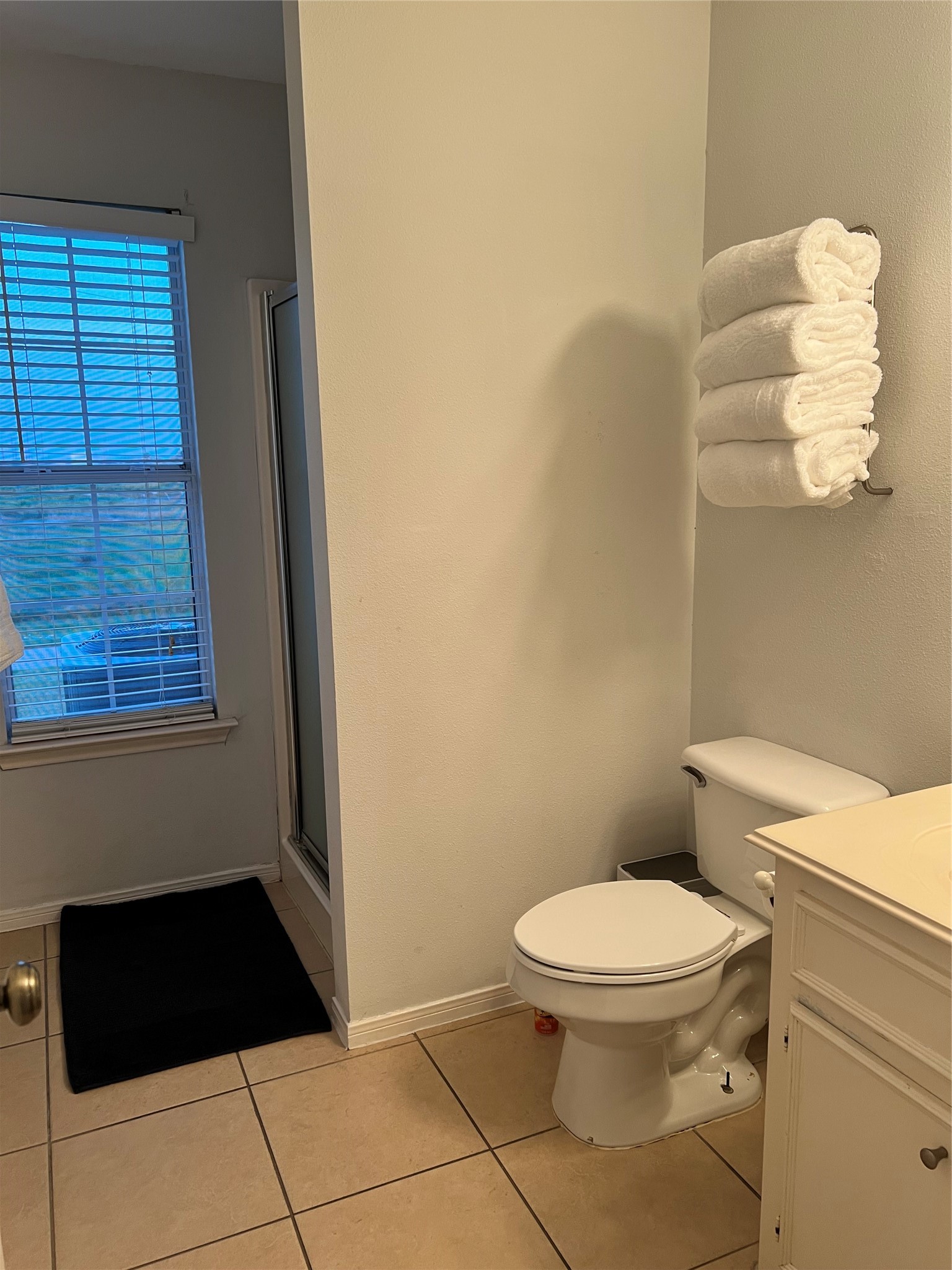 125 Marlin Avenue Freeport, TX 77541 - Photo 6 of 11 a bathroom with a toilet and a window