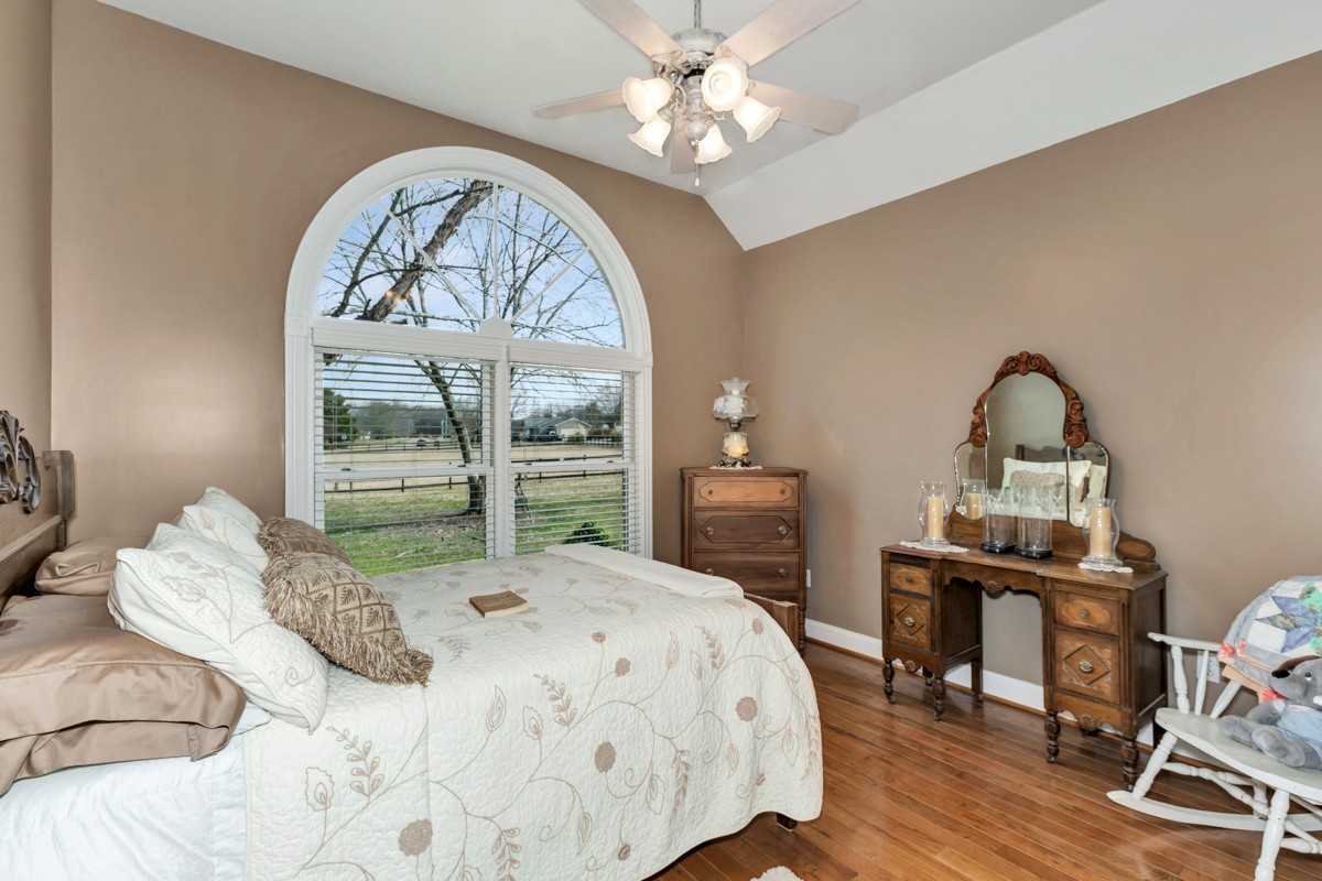 18789 Wells Road Athens, AL 35613 - Photo 20 of 40 a bedroom with a bed and a table