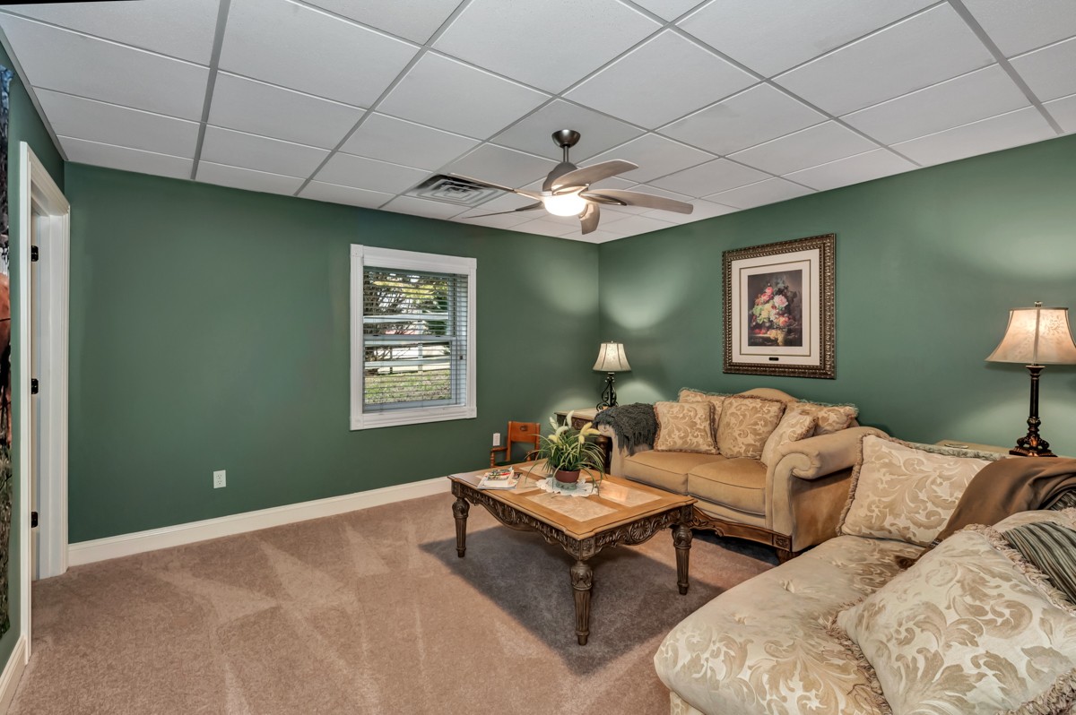 18789 Wells Road Athens, AL 35613 - Photo 26 of 40 a living room with furniture and a window